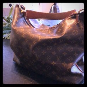 Louis Vuitton handbag great buy.  Great condition!